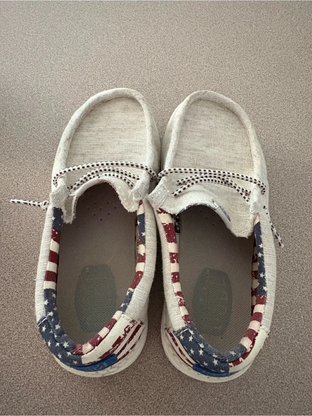 Hey Dude Kids Slip-On Sneakers in Natural with Red & Blue Flag Lining
